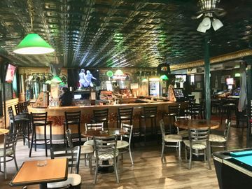 Cozy tavern featuring a pool table