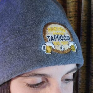 Embroidered taproom logo on gray beanie